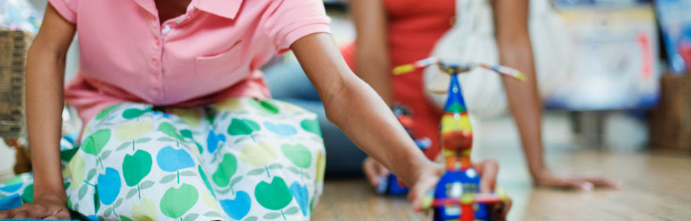 Mother and daughter playing.